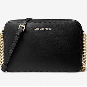 Black Michael Kors cross body with gold strap